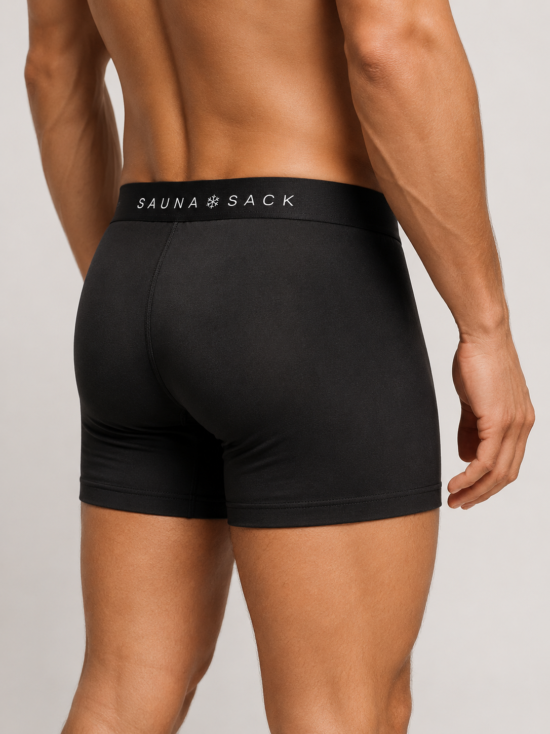 SaunaSack model wearing cooling briefs in a sauna